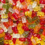 pile of gummy bears in an assortment of colors