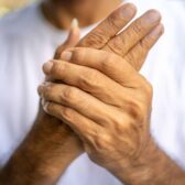 close up of man with wrist pain